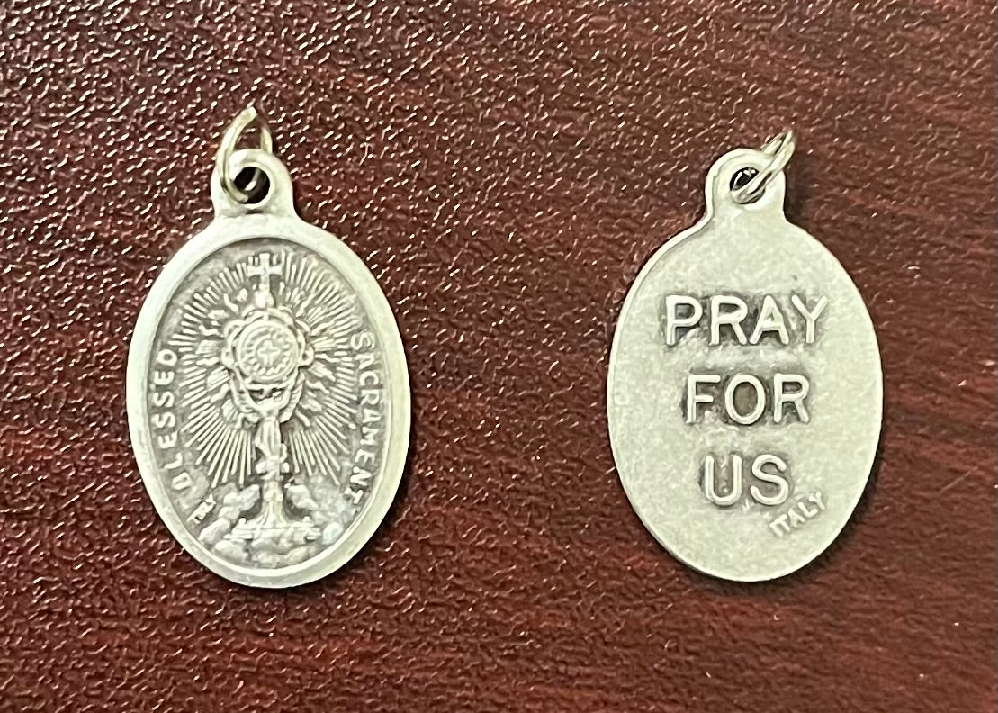 First Communion Medal – A Cherished Keepsake of the Blessed Sacrament